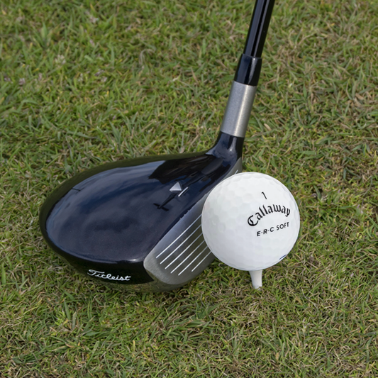 Used Callaway ERC Soft Triple Track golf ball on the course, white