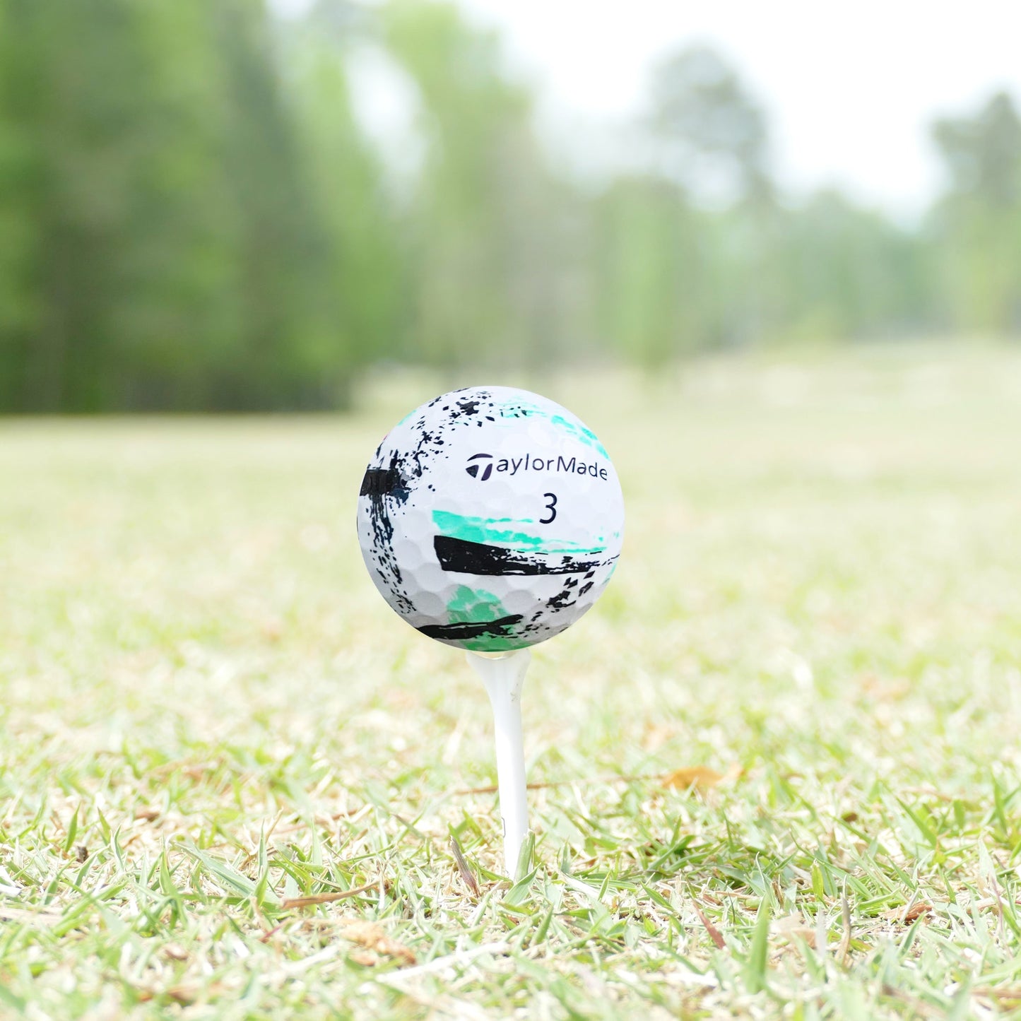 TaylorMade Speedsoft Ink recycled golf ball on the course